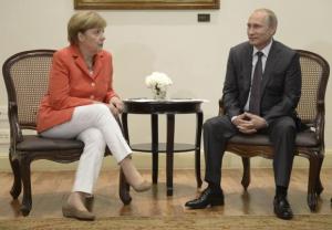 Russian President Putin meets with German Chancellor Merkel in Rio de Janeiro